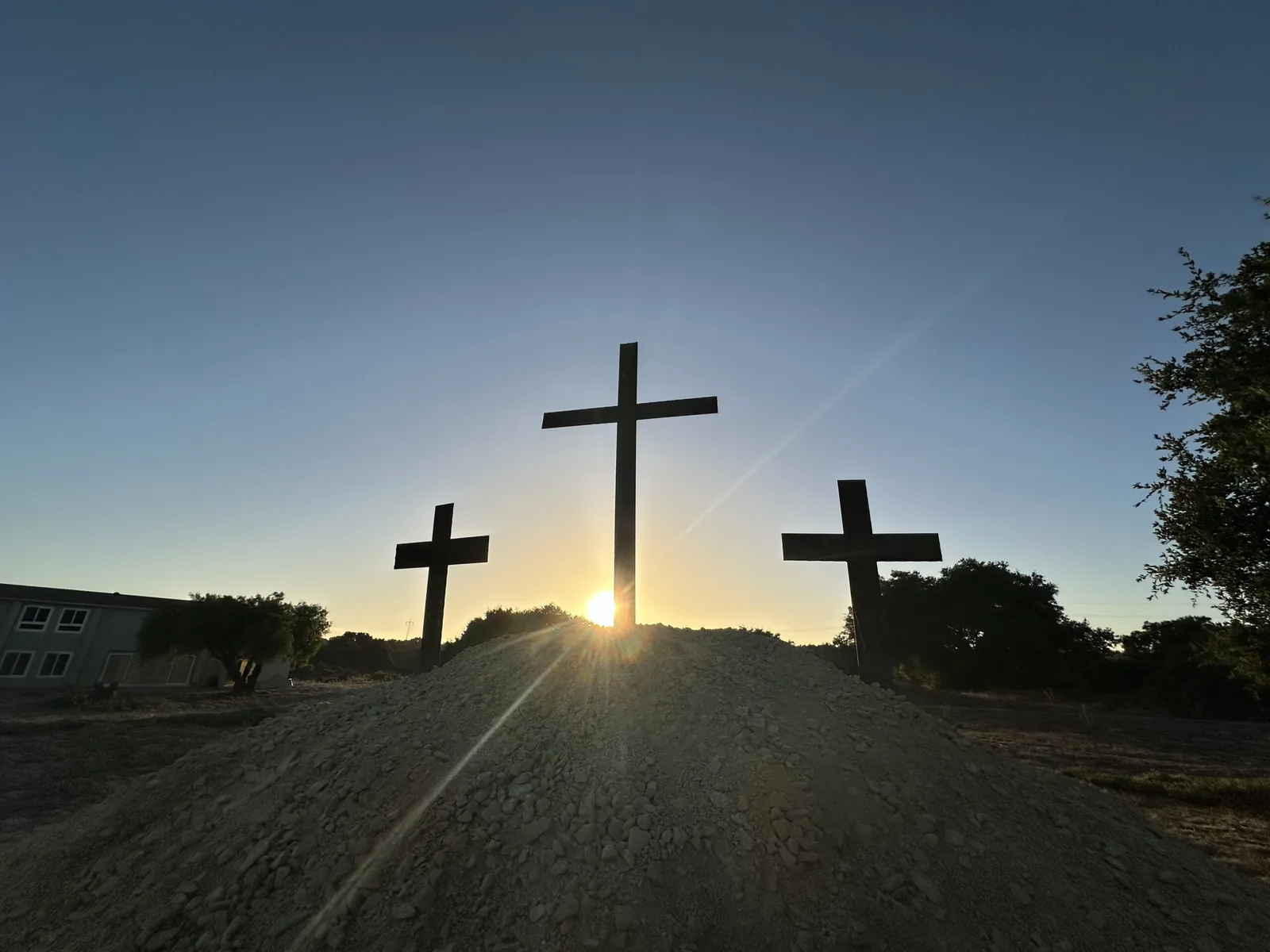 Three crosses on the hill at Hope Chapel at sunrise
